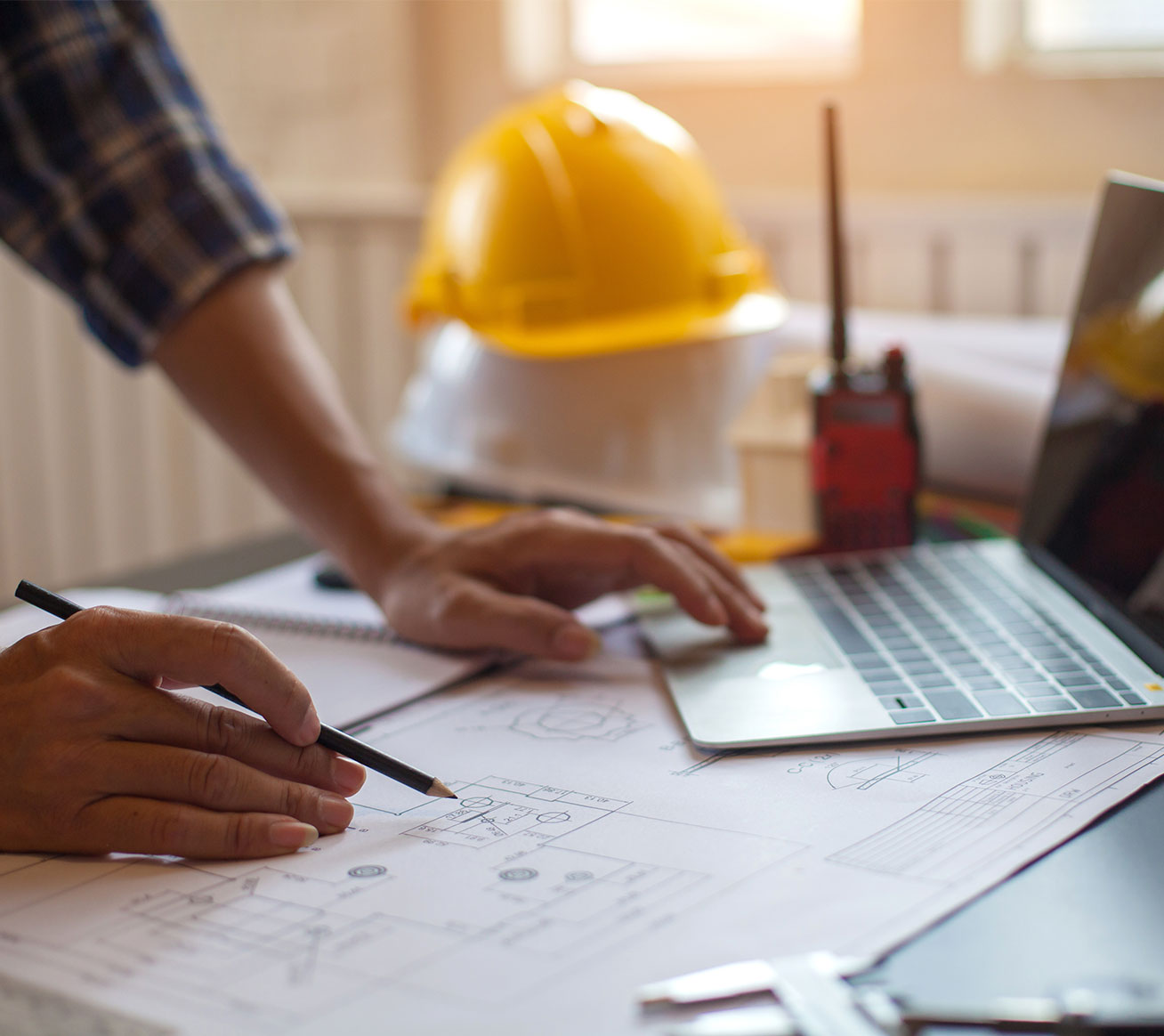 Construction superintendent working on plans